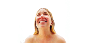 Austra turns heartbreak into ferocity on “Chin Up Buttercup“